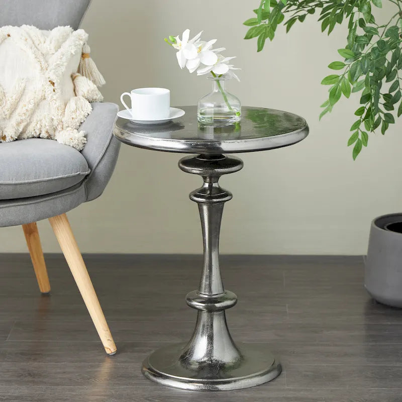Table d'appoint socle ronde noire en aluminium tourné, polie, de style moderne